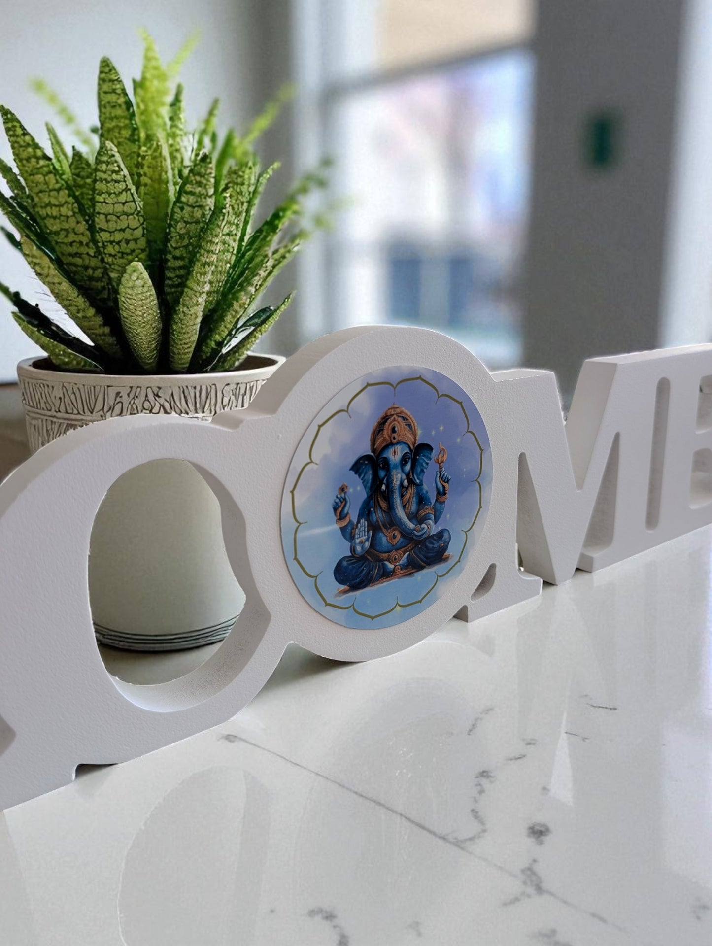 White Wooden “Welcome” Sign with Ganesh
